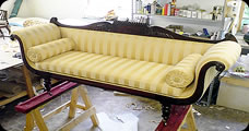 Regency settee with hair-filled cushion and bolsters